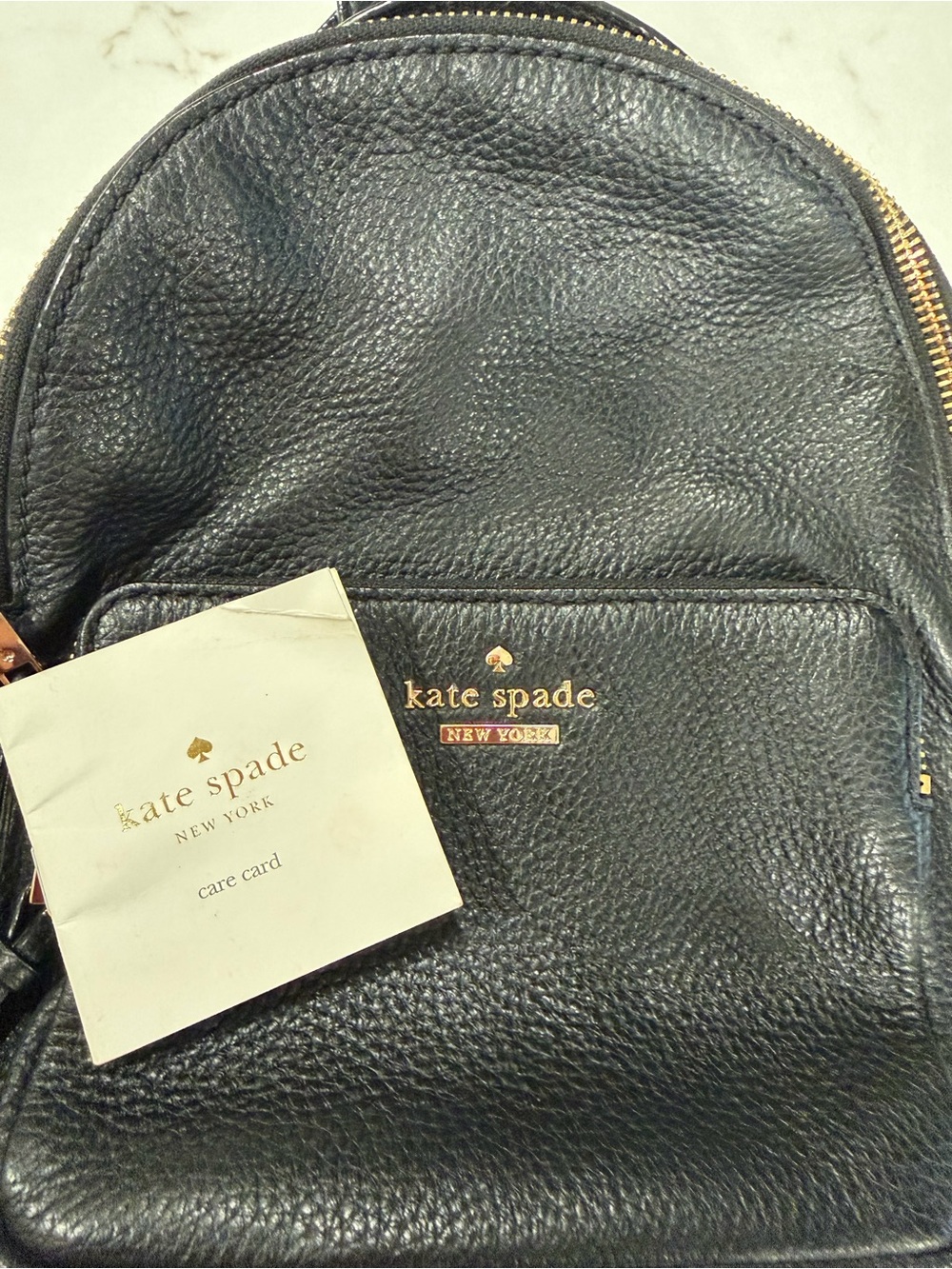 Kate Spade Black Pebbled Leather Backpack with Gold Hardware Striped Interior - Picture 7 of 9